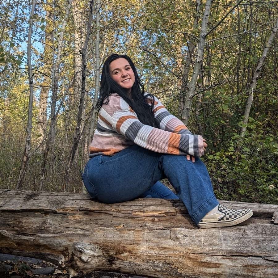 Hannah Glantz, kennel staff member, outdoors in the Flathead Valley